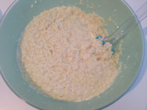 Mixing Nyonya tapioca kueh ingredients